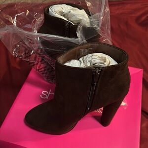 New never worn size 8.5 Brown Booties.